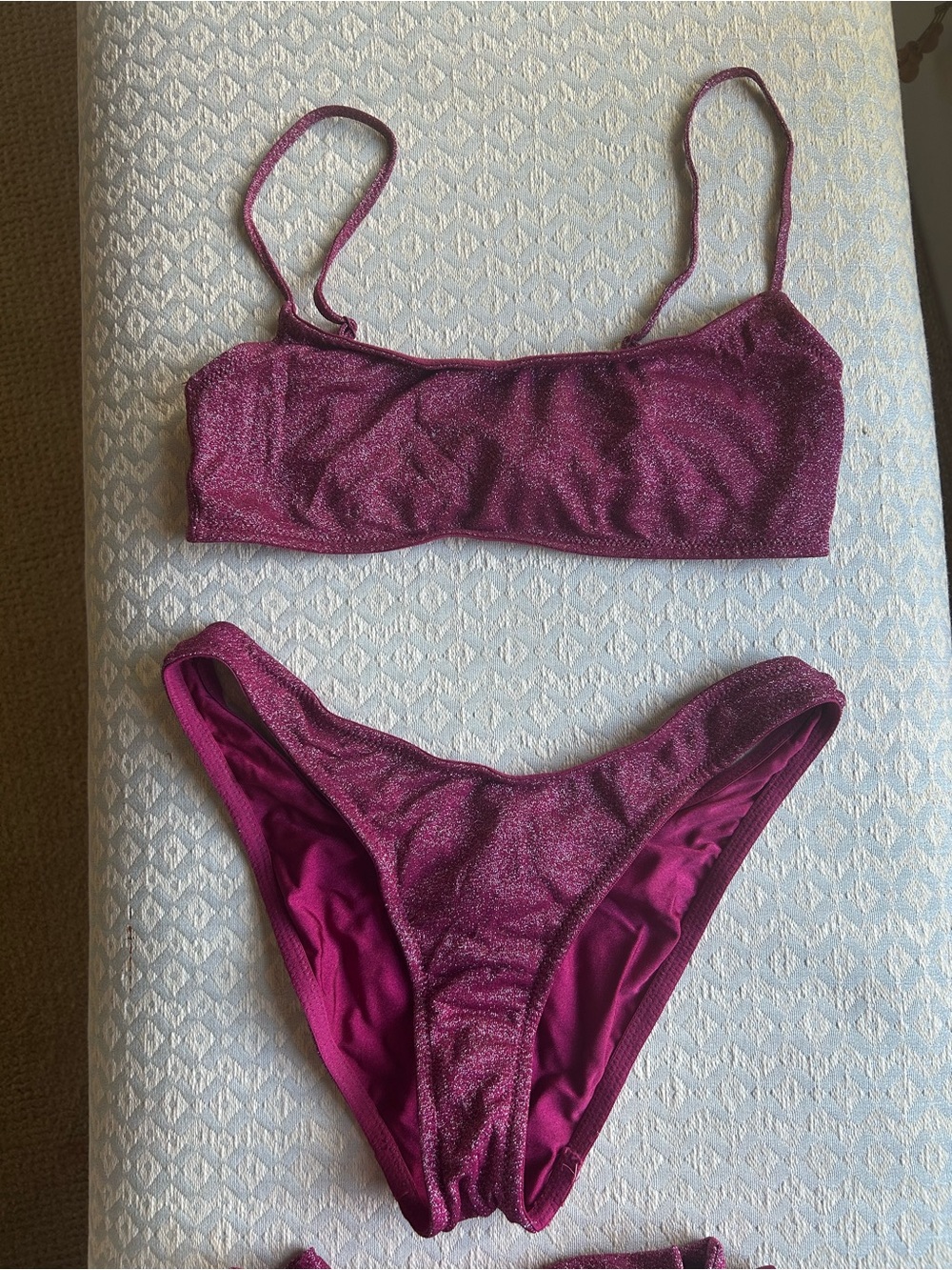 Women’s Shimmery Magenta Bikini
Swim Set with carry pouch. Size small. L